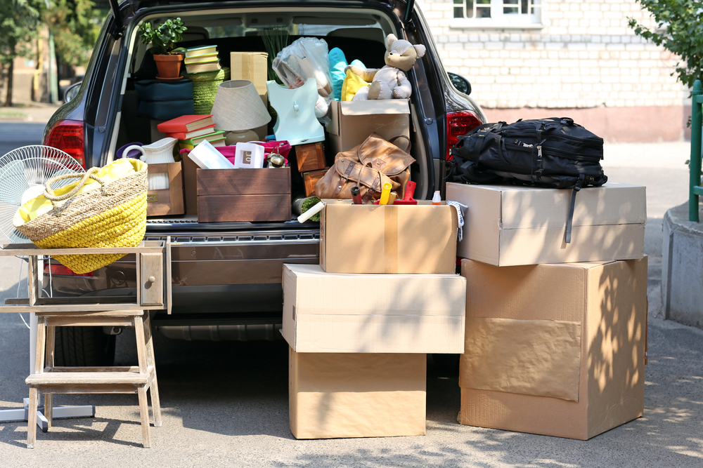 Moving,Boxes,And,Suitcases,In,Trunk,Of,Car,,Outdoors